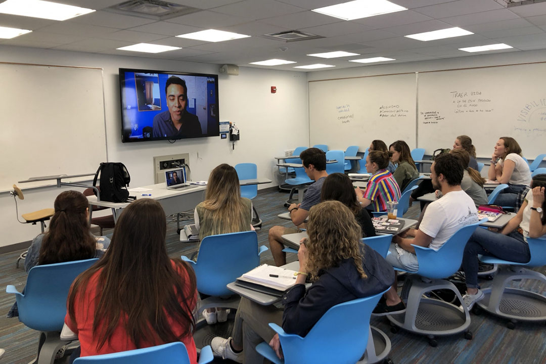 Students watching a movie in a Queer Latin America classroom