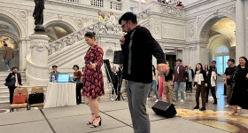 Professor Cuellar and Paulette Chavira conducting a class